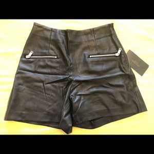 Faux leather high waisted shorts with zippers